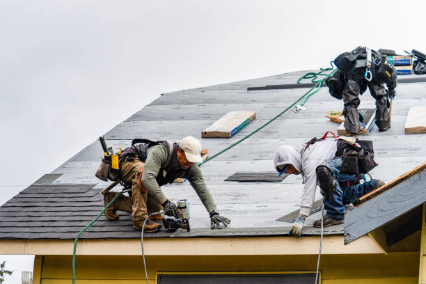 Professional Roofing technician working in Rockville, RI